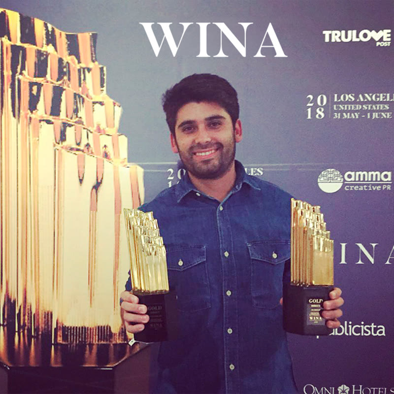 Fernando Riquelme con trofeos de oro en WINA Festival, Los Ángeles 2018
